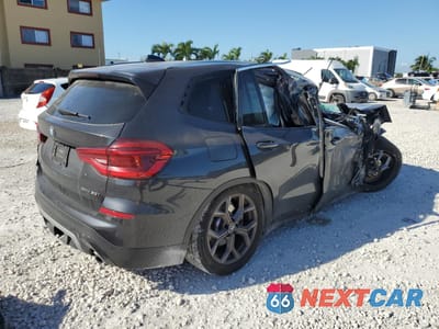 Trzecie zdjęcie samochodu z tyłu: 2021 BMW X3 XDRIVE30I VIN:5UXTY5C03M9E90726 - miniatura