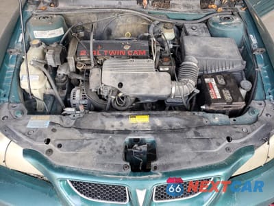 Zdjęcie 11 z 13 samochodu: 1999 PONTIAC GRAND AM SE VIN:1G2NE52T0XM701933 - miniatura