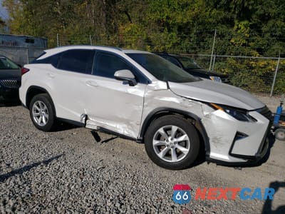 Czwarte zdjęcie samochodu z boku: 2016 LEXUS RX 350 BASE VIN:2T2BZMCA6GC031579 - miniatura