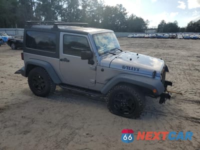 Czwarte zdjęcie samochodu z boku: 2017 JEEP WRANGLER SPORT VIN:1C4AJWAG8HL520747 - miniatura
