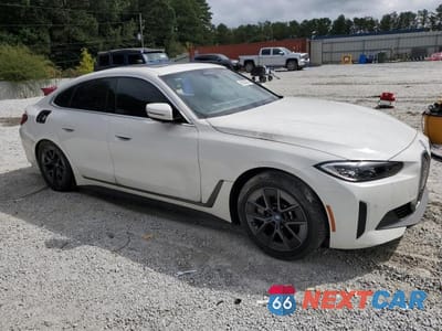 Czwarte zdjęcie samochodu z boku: 2024 BMW I4 EDRIVE 35 GC VIN:WBY43AW0XRFR52034 - miniatura