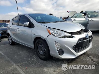 Czwarte zdjęcie samochodu z boku: 2015 TOYOTA PRIUS C VIN:JTDKDTB31F1102450 - miniatura
