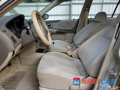 Zdjęcie 7 z 14 samochodu: 2003 MAZDA PROTEGE DX VIN:JM1BJ225430210759 - miniatura