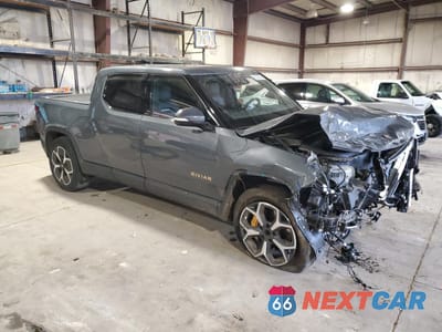 Czwarte zdjęcie samochodu z boku: 2022 RIVIAN R1T ADVENTURE VIN:7FCTGAAAXNN009136 - miniatura