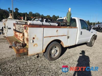 Trzecie zdjęcie samochodu z tyłu: 2006 FORD F350 UTILITY / SERVICE TRUCK VIN:1FDSF34566EB92532 - miniatura