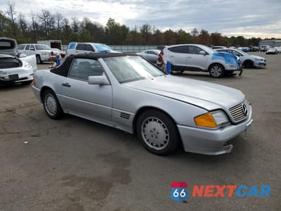 Czwarte zdjęcie samochodu z boku: 1990 MERCEDES-BENZ 500 SL VIN:WDBFA66E3LF009952 - miniatura