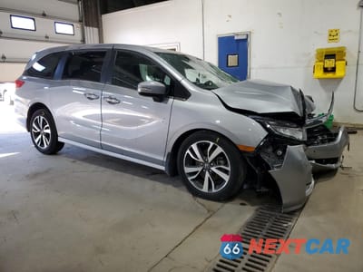 Czwarte zdjęcie samochodu z boku: 2023 HONDA ODYSSEY TOURING VIN:5FNRL6H87PB046027 - miniatura