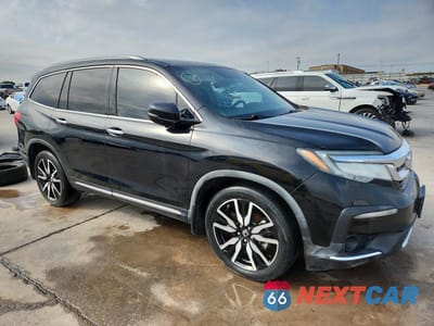 Czwarte zdjęcie samochodu z boku: 2019 HONDA PILOT TOURING AWD 8-PASS VIN:5FNYF6H96KB019549 - miniatura
