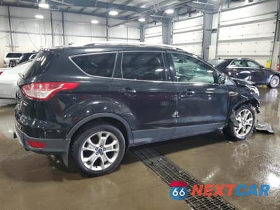 Trzecie zdjęcie samochodu z tyłu: 2014 FORD ESCAPE TITANIUM VIN:1FMCU9J93EUA05322 - miniatura