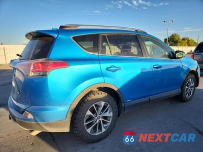 Trzecie zdjęcie samochodu z tyłu: 2018 TOYOTA RAV4 HV VIN:JTMRJREV2JD187989 - miniatura