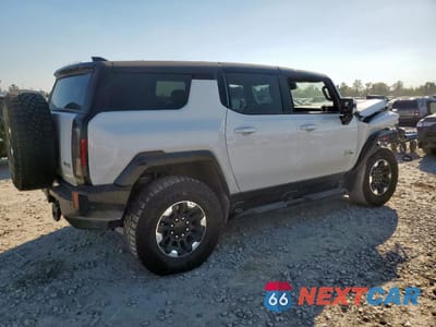 Trzecie zdjęcie samochodu z tyłu: 2024 GMC HUMMER SUV 3X VIN:1GKB0RDC4RU110531 - miniatura