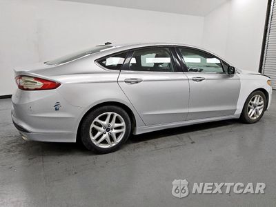Trzecie zdjęcie samochodu z tyłu: 2016 FORD FUSION SE VIN:3FA6P0H79GR197435 - miniatura