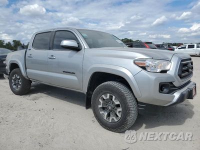 Czwarte zdjęcie samochodu z boku: 2022 TOYOTA TACOMA DOUBLE CAB VIN:3TMAZ5CN4NM176813 - miniatura