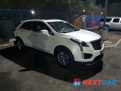 Czwarte zdjęcie samochodu z boku: 2021 CADILLAC XT5 PREMIUM LUXURY VIN:1GYKNCRS0MZ222100 - miniatura