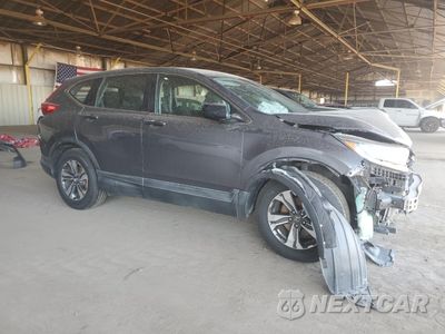 Czwarte zdjęcie samochodu z boku: 2018 HONDA CR-V LX VIN:2HKRW5H33JH418560 - miniatura
