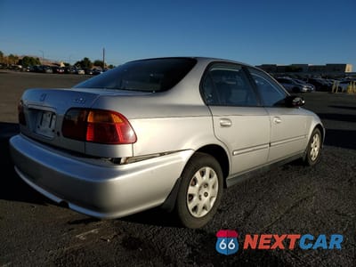Trzecie zdjęcie samochodu z tyłu: 2000 HONDA CIVIC BASE VIN:2HGEJ6615YH551894 - miniatura