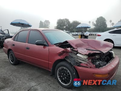 Czwarte zdjęcie samochodu z boku: 1997 TOYOTA COROLLA BASE VIN:1NXBA02EXVZ647838 - miniatura
