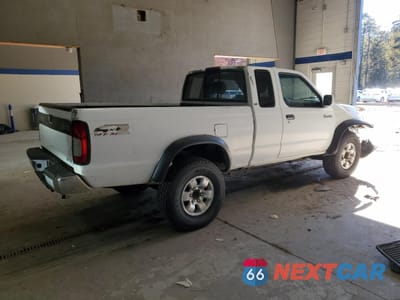 Trzecie zdjęcie samochodu z tyłu: 1999 NISSAN FRONTIER KING CAB XE VIN:1N6ED26Y4XC345475 - miniatura