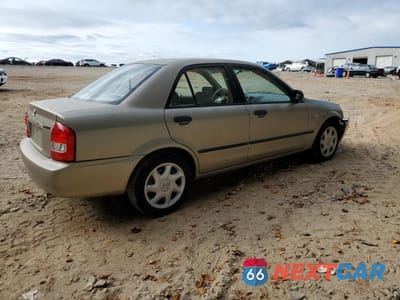 Trzecie zdjęcie samochodu z tyłu: 2003 MAZDA PROTEGE DX VIN:JM1BJ225430210759 - miniatura