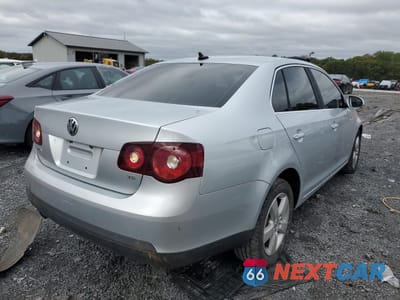Trzecie zdjęcie samochodu z tyłu: 2009 VOLKSWAGEN JETTA SE VIN:3VWRM71K99M028620 - miniatura