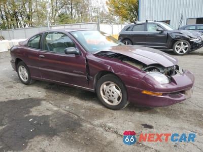 Czwarte zdjęcie samochodu z boku: 1996 PONTIAC SUNFIRE SE VIN:1G2JB1241T7541420 - miniatura