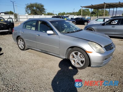 Czwarte zdjęcie samochodu z boku: 2003 INFINITI G35 VIN:JNKCV51EX3M026008 - miniatura