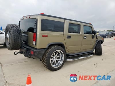 Trzecie zdjęcie samochodu z tyłu: 2005 HUMMER H2 VIN:5GRGN23U95H126939 - miniatura
