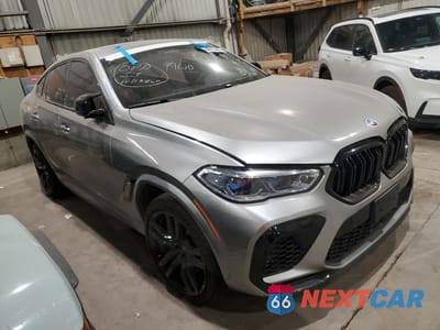 Czwarte zdjęcie samochodu z boku: 2021 BMW X6 M VIN:5YMCY0C08M9078760 - miniatura