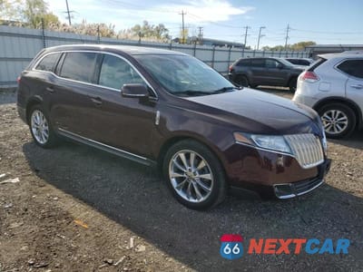 Czwarte zdjęcie samochodu z boku: 2011 LINCOLN MKT VIN:2LMHJ5AT5BBJ51164 - miniatura