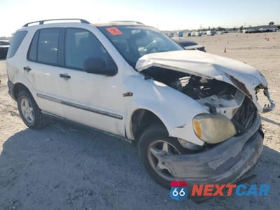Czwarte zdjęcie samochodu z boku: 1998 MERCEDES-BENZ ML 320 VIN:4JGAB54E6WA029423 - miniatura