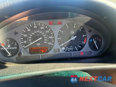 Zdjęcie 8 z 15 samochodu: 1994 BMW 325 IC VIN:WBABJ5325RJC79453 - miniatura