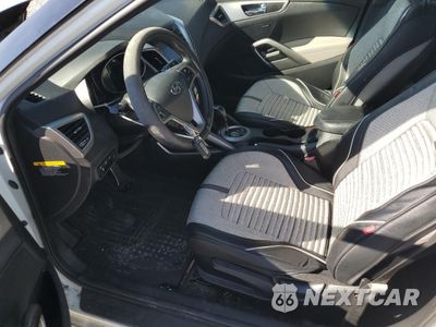 Zdjęcie 7 z 12 samochodu: 2013 HYUNDAI VELOSTER VIN:KMHTC6AD4DU104557 - miniatura