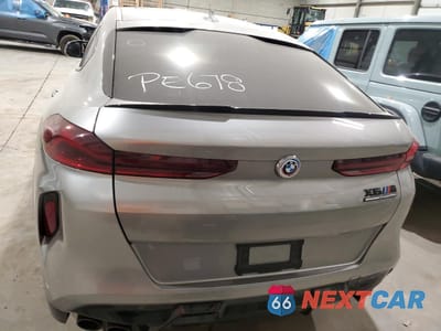 Zdjęcie 6 z 12 samochodu: 2021 BMW X6 M VIN:5YMCY0C08M9078760 - miniatura