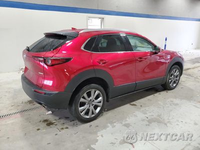 Trzecie zdjęcie samochodu z tyłu: 2022 MAZDA CX-30 PREMIUM VIN:3MVDMBDL2NM401915 - miniatura