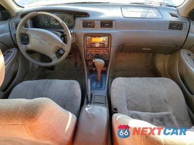 Zdjęcie 8 z 11 samochodu: 2000 TOYOTA CAMRY CE VIN:JT2BG22K6Y0490155 - miniatura