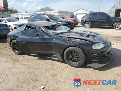 Czwarte zdjęcie samochodu z boku: 1999 MAZDA MX-5 MIATA VIN:JM1NB3531X0118735 - miniatura