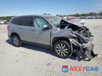 Czwarte zdjęcie samochodu z boku: 2019 HONDA PILOT EXL VIN:5FNYF6H54KB058699 - miniatura