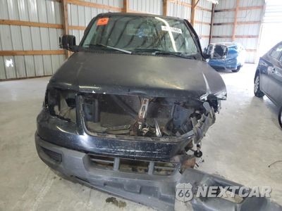 Piąte zdjęcie samochodu w środku: 2004 FORD EXPEDITION XLS VIN:1FMRU13W84LB82029 - miniatura