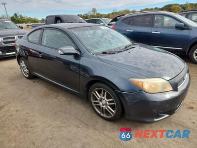 Czwarte zdjęcie samochodu z boku: 2005 TOYOTA SCION TC VIN:JTKDE177350047860 - miniatura