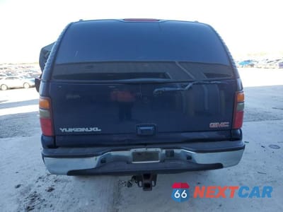 Zdjęcie 6 z 12 samochodu: 2003 GMC YUKON XL C1500 VIN:1GKEC16Z33J281464 - miniatura