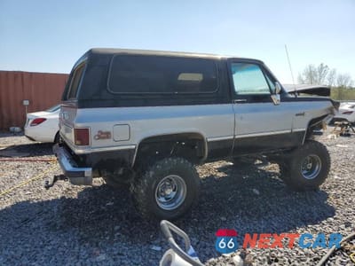 Trzecie zdjęcie samochodu z tyłu: 1984 GMC JIMMY K1500 VIN:1G5EK18H2EF513682 - miniatura