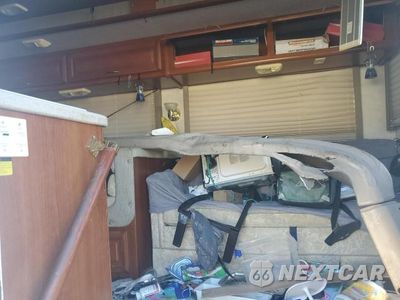 Zdjęcie 6 z 10 samochodu: 2002 FORD MOTORHOME CHASSIS REVCREATIONAL VEHICLE VIN:1FCNF53SX20A04929 - miniatura