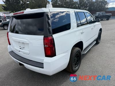 Czwarte zdjęcie samochodu z boku: 2018 CHEVROLET TAHOE POLICE VIN:1GNLCDEC7JR229262 - miniatura