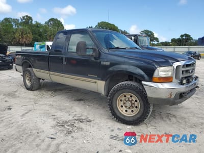 Czwarte zdjęcie samochodu z boku: 1999 FORD F250 SUPER DUTY VIN:1FTNX21F5XED63553 - miniatura