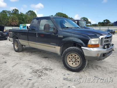 Czwarte zdjęcie samochodu z boku: 1999 FORD F250 SUPER DUTY VIN:1FTNX21F5XED63553 - miniatura