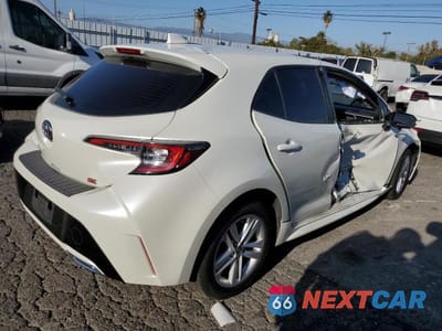 Trzecie zdjęcie samochodu z tyłu: 2019 TOYOTA COROLLA HATCHBACK SE VIN:JTNK4RBE2K3043861 - miniatura
