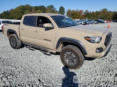 Czwarte zdjęcie samochodu z boku: 2019 TOYOTA TACOMA DOUBLE CAB VIN:3TMDZ5BN9KM079651 - miniatura