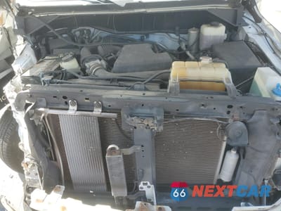 Zdjęcie 12 z 13 samochodu: 2018 NISSAN NV 1500 DELIVERY VAN VIN:1N6BF0KM9JN818528 - miniatura