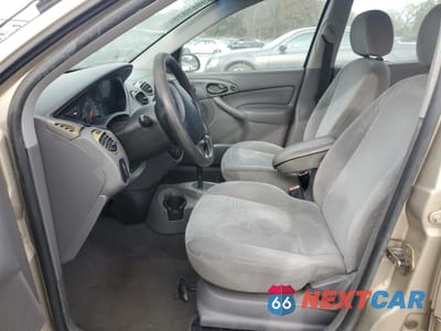 Zdjęcie 7 z 14 samochodu: 2002 FORD FOCUS SE VIN:1FAFP34P22W261327 - miniatura