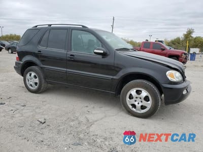 Czwarte zdjęcie samochodu z boku: 2003 MERCEDES-BENZ ML 350 VIN:4JGAB57E03A451503 - miniatura